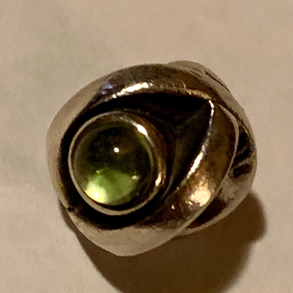 Authentic Pandora peridot eye charm retired